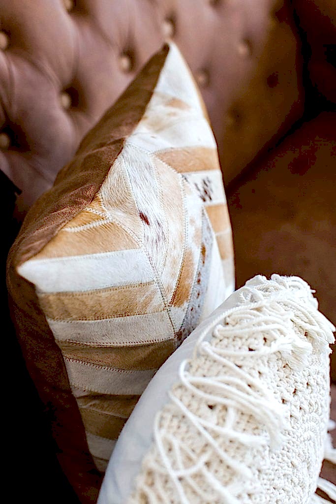 Interior Consultancy - brown lounge with white and brown pillows